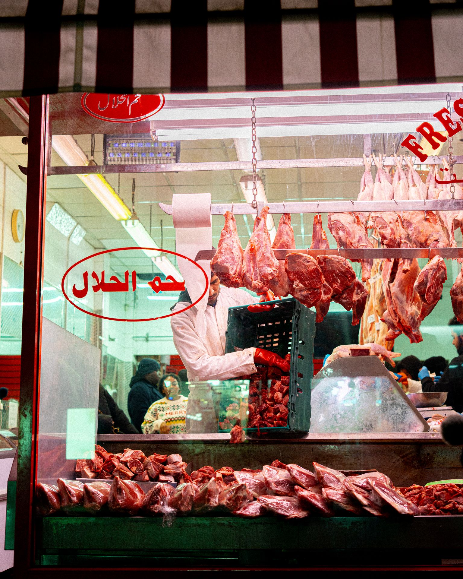 Man At Butcher Shop, photography by Adam Drake Studio, Cornwall